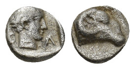 Karia, Halikarnassos (?) AR Hemiobol. (7mm, 0.49 g) Circa 400-340 BC. Young male head to right, Karian legend S-A across fields. / Head of ram to righ...