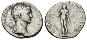 Trajan AR Denarius. Rome, AD 114-117. (3.27 Gr. 18mm.)
Laureate and draped bust right 
Rev. Genio standing left, holding patera and ears of corn.