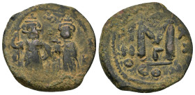 Heraclius/Heraclius Constantine AE. Follis. 610-641 AD. Constantinople (7.4 Gr. 26mm.)
 Heraclius on the left and Heraclius Constantine on right, both...