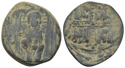 Michael IV. Follis. 1034-1041 AD. Constantinople. (9.3 Gr. 28mm.)
Christ Antiphonetes standing facing, holding Gospels and raising hand in benediction...