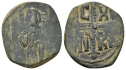 Michael IV. Follis. 1034-1041 AD. Constantinople. (7.5 Gr. 29mm.)
Christ Antiphonetes standing facing, holding Gospels and raising hand in benediction...