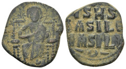 Constantine IX Monomachus AD 1042-1055. AE Follis (8.2 Gr. 30mm.) Constantinople 
Bust of Christ, nimbate, seated facing on throne with back, holding ...