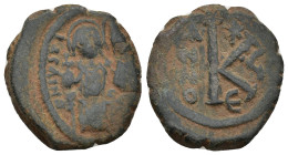 Justin II, with Sophia. 565-578. AE. Half Follis (6. Gr. 26mm.). Constantinople 
 Nimbate Justin II, holding globus cruciger, and nimbate Sophia seate...
