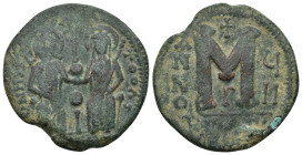 Justin II. 565-578. AE Follis. Constantinople (14.15 Gr. 31mm.)
Justin and Sophia, both nimbate, enthroned facing; Justin holding globus cruciger and ...