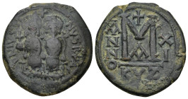 Justin II and Sophia AD 565-578. Cyzicus Follis or 40 Nummi AE.(13.43 Gr. 29mm.)
 Justin and Sophia, seated facing on double throne 
Rev. Large M betw...