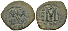 JUSTIN II. 565-578 AD. AE Follis (15.86 Gr. 37mm.). Constantinople. 
Justin and Sophia enthroned, facing 
Rev. Large M with Christogram; B/CON.