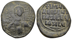 Anonymous Æ Follis. (31mm, 11.47 g) Constantinople, circa AD 976-1035. +ЄMMANOVHΛ, facing bust of Christ, holding book of Gospels; cross and four pell...