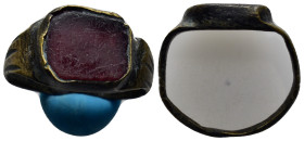 A ring with red stone. 17mm, 5.9 gr.