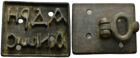 Roman Bread Stamp with Inscription. 3rd-5th century AD. A rectangular bronze bread stamp with legend. 70mm, 187.6 g