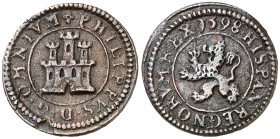 1598. Felipe II. Segovia. 1 maravedí. (Cal. 870). 1,56 g. Sin indicación de ceca ni valor. Tipo "OMNIVM". Hojita. Escasa. MBC.
