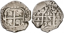 1654. Felipe IV. Potosí. E. 1 real. (Cal. falta). 2,52 g. PH bajo corona en reverso. Doble fecha y triple ensayador. Rayita. Rara. MBC-.
