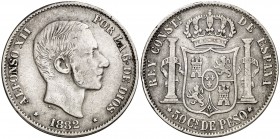 1882. Alfonso XII. Manila. 50 centavos. (Cal. 82). 12,74 g. Rayitas. MBC.
