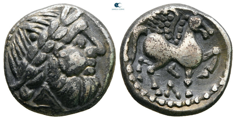 Eastern Europe. Imitations of Philip II of Macedon 100 BC. 
Drachm AR

16 mm,...