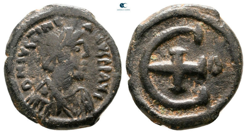 Justinian I AD 527-565. Theoupolis (Antioch)
Pentanummium Æ

16 mm, 1,91 g
...