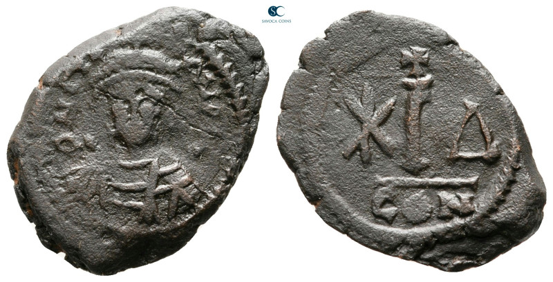 Maurice Tiberius AD 582-602. Constantinople
Decanummium Æ

21 mm, 2,97 g

...