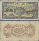 China: Peoples Bank of China, first series Renminbi 1949, 200 Yuan, serial number II X I 6593159, P.841, almost well worn condition with a number of s...