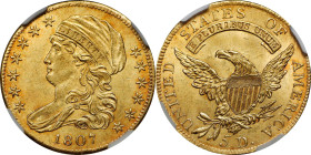 1807 Capped Bust Left Half Eagle. BD-8. Rarity-2. MS-63 (NGC).
Billowy mint frost mingles with bright medium gold color and, at the peripheries, deli...