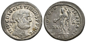 IMPERIO ROMANO. DIOCLECIANO. Follis. Alejandría (301). A/ Cabeza laureada a der.; IMP C DIOCLETIANVS P F AVG. R/ Genio a izq. con cornucopia y pátera;...