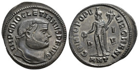 IMPERIO ROMANO. DIOCLECIANO. Follis. Antioquía (300-301). A/ Cabeza laureada a der.; IMP C DIOCLETIANVS P F AVG. R/ Genio a izq. con cornucopia y páte...