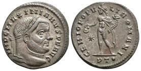 IMPERIO ROMANO. MAXIMIANO. Follis. Ticinum (298-299). A/ Cabeza laureada a der.; IMP C MAXIMIANVS P F AVG. R/ Genio a izq. con cornucopia y pátera; GE...