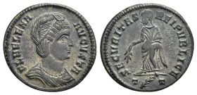 IMPERIO ROMANO. HELENA. Follis. Ticinum (326-327). A/ Busto drapeado a der.; FL HELENA AVGVSTA. R/ Securitas a izq. con rama; SECVRITAS REIPVBLICE. -/...