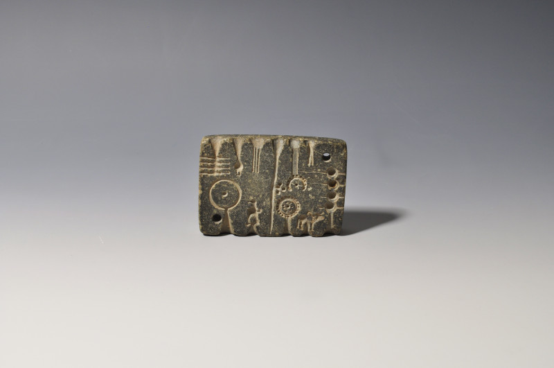 PRÓXIMO ORIENTE. Mesopotamia. Molde para joyas (I milenio a.C.). Piedra. Longitu...