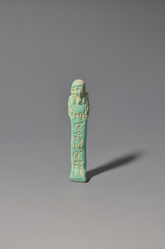 EGIPTO. Baja Época. Ushebti (ca. 332 a.C.). Fayenza. Altura 7 cm. Ex colección B...