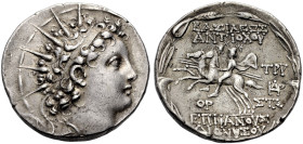 KÖNIGREICH DER SELEUKIDEN. 
Antiochos VI. Dionysos, 144-142 v. Chr. Tetradrachmon, Jahr 170 der S. Ä., 143-142 v. Chr. Antiochia. Kopf mit Binde und ...