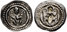 KONSTANZ, BISCHÖFLICHE MÜNZSTÄTTE. 
KONRAD II. VON TEGERFELDEN, 1209-1233. Brakteat um 1220-1230. Sitzender Bischof von vorn, die Rechte hält einen K...