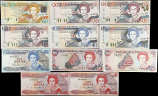 MIXED LOTS. Lot of (22). Cayman Islands Currency Board & Eastern Caribbean Central Bank. 1 to 50 Dollars, Mixed Dates. P-Various. Very Fine to Uncircu...
