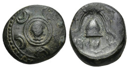 Kings of Macedon. Philip III (323-317 BC). AE. (4.61 Gr. 16mm.). Salamis. 
Macedonian shield, facing gorgoneion on boss. 
Rev. Helmet; kerykeion and m...