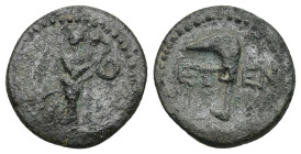 PISIDIA. Etenna. AE (1st century BC). (2.9 Gr. 17mm.)
Nymph advancing right, entwined by serpent; amphora lying right in field. 
Rev: E - T. Sickle-sh...