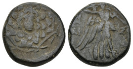 Pontos. Amisos circa 105-63 BC. (8.23 Gr. 19mm.)
Aegis with Gorgon's head at center 
Rev. Nike advancing right, holding wreath and palm branch, betwee...
