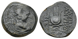 Seleukid Kingdom. Antiochos VII Euergetes. 138-129 B.C. AE (6.44 Gr. 17mm). Antioch
 Winged bust of Eros right 
Rev. Isis headdress; star above EOP be...