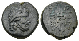 Mysia, Pergamon. Civic Issue. 200-113 B.C. AE (5 Gr. 16mm.). 
Laureate head of Aesclepios (or Zeus) right 
Rev. legend vertically downward to right an...
