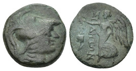 Pamphylia, Side, 2nd-1st centuries BC. AE. (2.7 Gr. 15mm.) 
Helmeted head of Athena right. 
Rev. Nike standing left, holding wreath and palm; pomegran...