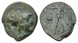 Pamphylia, Side, 2nd-1st centuries BC. AE. (2.57 Gr. 15mm.) 
Helmeted head of Athena right. 
Rev. Nike standing left, holding wreath and palm; pomegra...