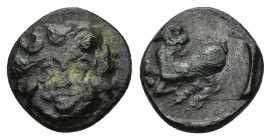 Kelenderis (BC 200-100) AE ca 2nd century BC. (1.4 Gr.11mm).
 Facing gorgoneion 
Rev. Goat kneeling right, head reverted