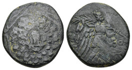 Pontos, Amisos. Under Mithradates VI Eupator. Ca. 85-65 B.C. AE (6.8 Gr. 20mm).
 Octagonal shield bearing aegis, Gorgoneion in center 
Rev. Nike walki...