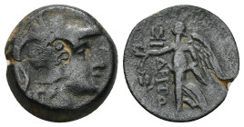 Pamphylia, Side, 2nd-1st centuries BC. AE (3.62 Gr. 16mm.) 
 Helmeted head of Athena right. 
 Rev. Nike standing l., holding wreath and palm; pomegran...