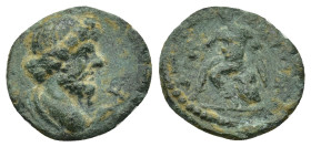 Uncertain Greek Bronze Coins (1.84 Gr. 14mm.)
Head of Zeus (?) left
Rev. Stead of rock Apollo.