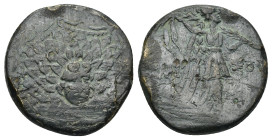 Pontos. Amisos circa 105-63 BC. AE. (6.16 Gr. 20mm.) 
Aegis with Gorgon's head at center 
Rev. Nike advancing right, holding wreath and palm branch, b...