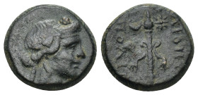 Phrygia, Dionysopolis. 1st century BC. AE (3.47 Gr. 15mm.) 
Wreathed head of Dionysos right. 
 Rev. Filleted thyrsos flanked by crescent and star.