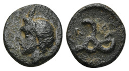 Lycian Dynasts. Perikles. Ca. 380-360 B.C. AE (1.6 Gr. 12mm.). 
Horned head of Pan left 
Rev. Triskeles