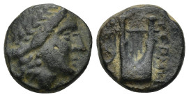 IONIA. Kolophon. AE (Circa 389-350 BC). (4.3 Gr. 15mm.) 
 Head of Apollo right, wearing tainia. 
Rev. Lyre.