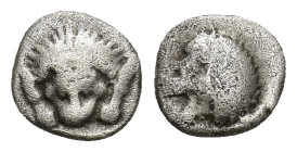 CARIA. Mylasa. Circa 420-390 BC. Hemiobol (0.48 Gr. 7mm.)
 Forepart of a roaring lion to right, head turned back to left. 
Rev. Facing forepart of a l...