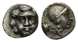 Pisidia, AR Obol Selge 3rd Century BC. (0.88 Gr. 9mm.)
Facing head of Gorgoneion 
Rev. Helmeted head of Athena right, astragal behind