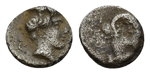 Uncertain Greek Coins Silver (0.46 Gr. 7mm.)
Head of Apollo right (?)
Rev. Uncer...