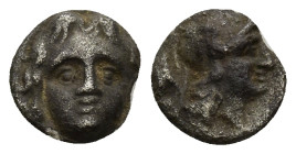 Pisidia, AR Obol Selge 3rd Century BC. (0.87 Gr. 9mm.)
Facing head of Gorgoneion 
Rev. Helmeted head of Athena right, astragal behind