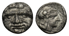 Pisidia, AR Obol Selge 3rd Century BC. (0.93 Gr. 9mm.)
Facing head of Gorgoneion 
Rev. Helmeted head of Athena right, astragal behind